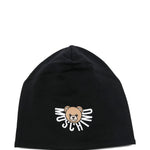 Cappello nero Moschino Kids in jersey con logo e orsetto Teddy stampato. Un accessorio comodo e stiloso per look casual e urban dei più piccoli.