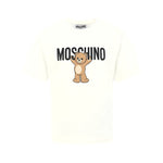 T-shirt panna Moschino Kids in cotone con stampa orsetto Teddy e logo. Comfort e stile per un look casual e riconoscibile ogni giorno.