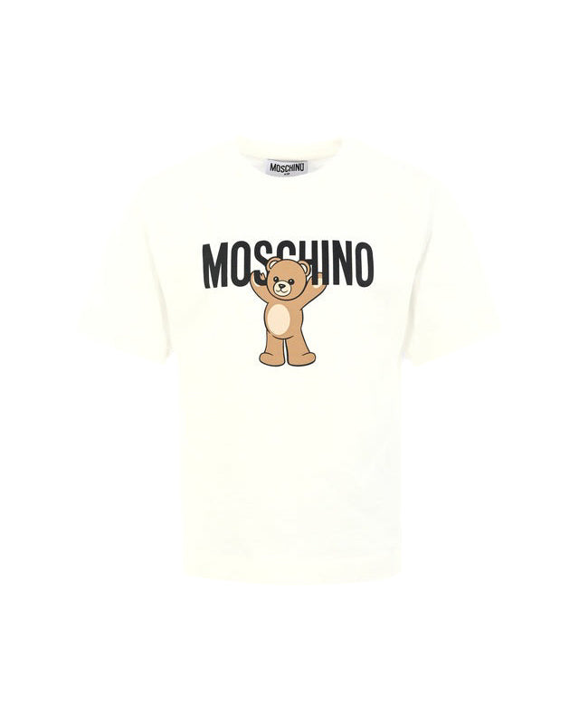 T-shirt panna Moschino Kids in cotone con stampa orsetto Teddy e logo. Comfort e stile per un look casual e riconoscibile ogni giorno.
