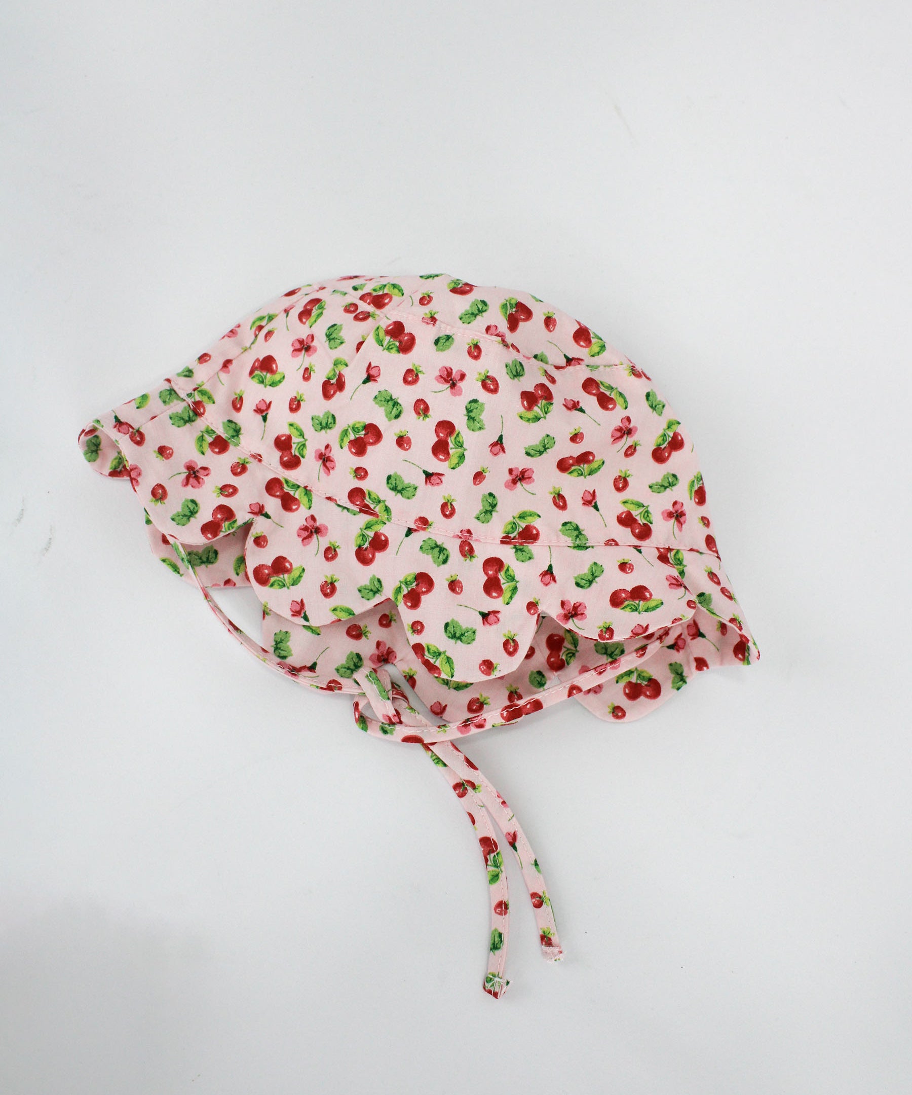 Deolinda Cappellino Fantasia Cherry per Neonate