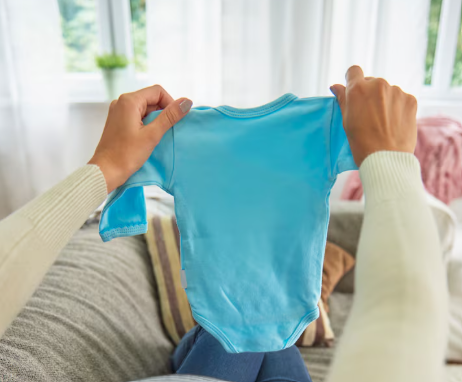 Come scegliere taglia vestiti neonato