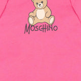 Moschino Kids Tutina Fuxia con Colletto Bianco e Stampa Teddy Bear con Logo per Neonate