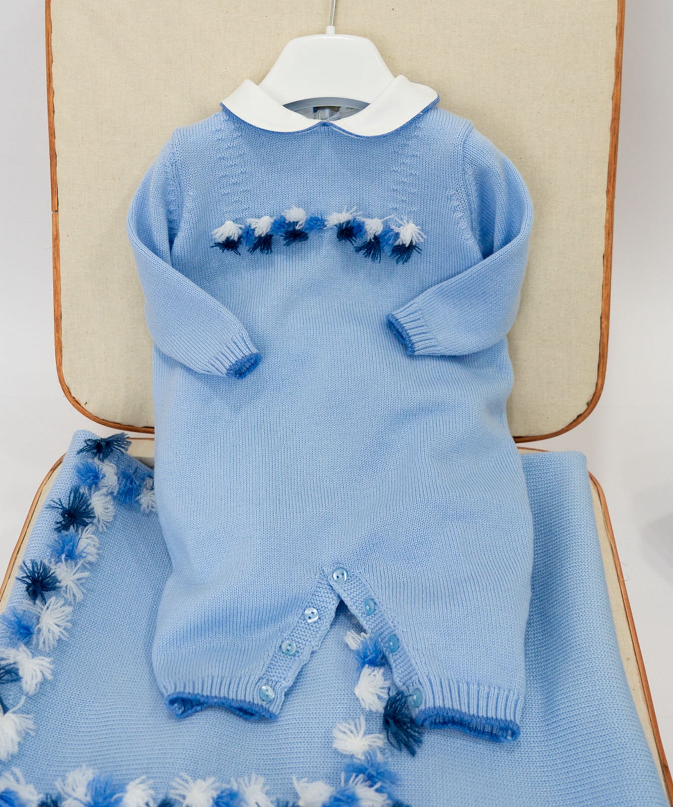 Le Coconnè Tutina Celeste con Pon Pon per Neonati