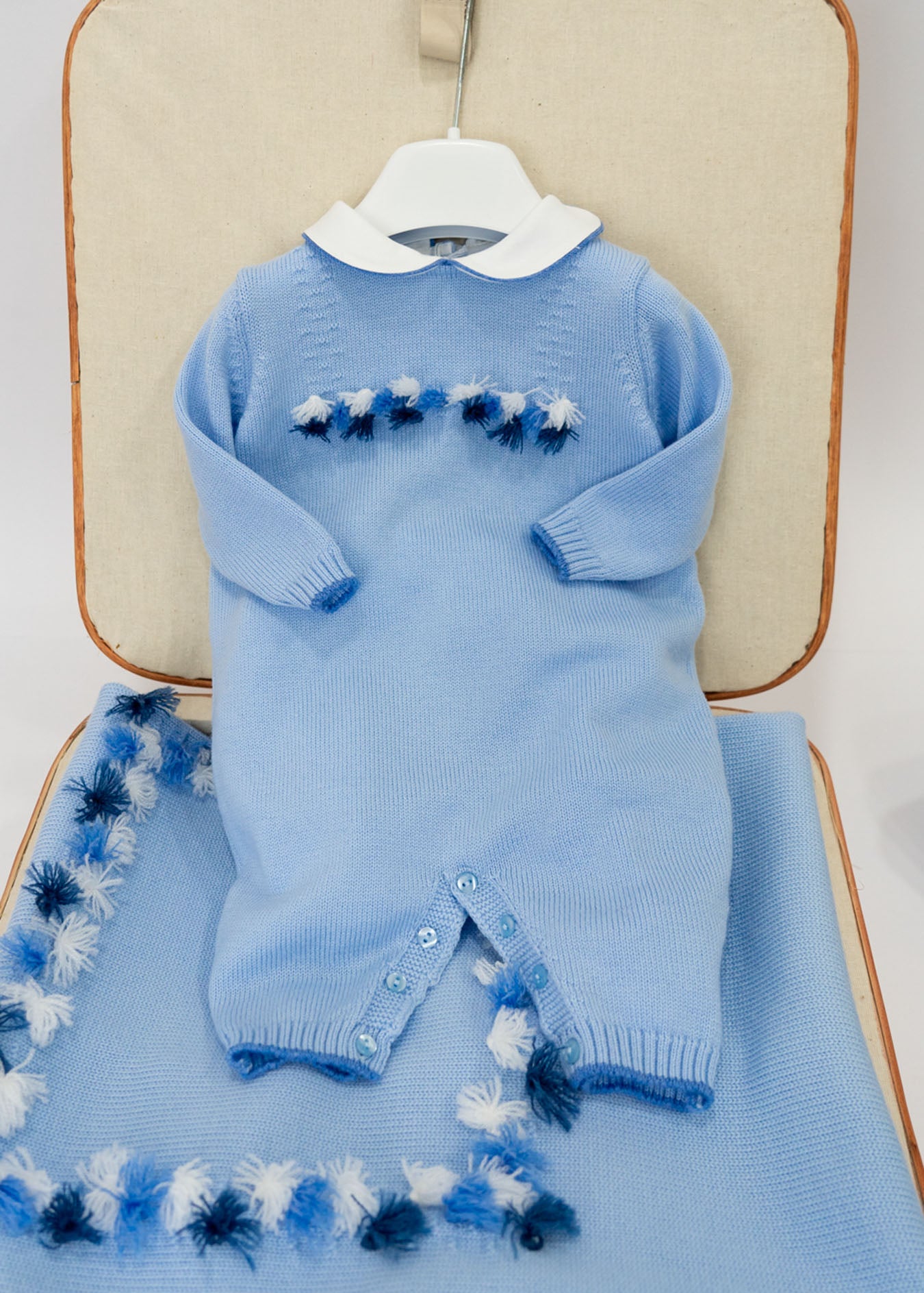 Le Coconnè Tutina Celeste con Pon Pon per Neonati