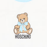 Moschino Kids Set Celeste con Cappellino a Orecchie e Bavaglino con Stampa Teddy Bear e Logo per Neonati