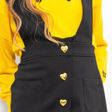 Moschino Kids Black Dungarees with Heart Logo Buttons for Girls