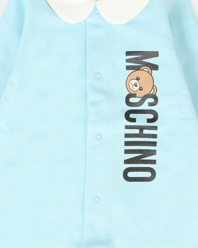 Moschino Kids Tutina Celeste con Logo Vertical per Neonati