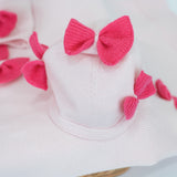 Le Coconnè Cappello Rosa con Fiocchi per Neonate
