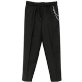 John Richmond Kids Pantalone Nero con Piega Stirata, Coulisse e Catena Removibile per Bambini