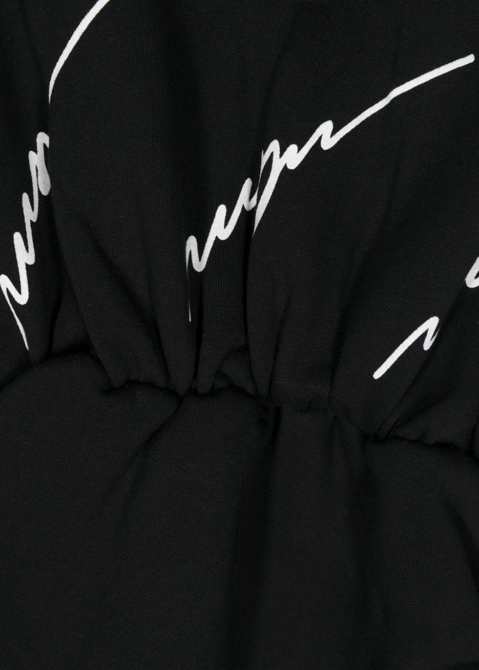 MSGM Kids Abito Nero Corto con Stampa Logo All-over per Bambine (dettaglio)