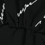 MSGM Kids Abito Nero Corto con Stampa Logo All-over per Bambine (dettaglio)
