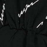 MSGM Kids Abito Nero Corto con Stampa Logo All-over per Bambine (dettaglio)
