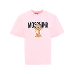 T-shirt panna Moschino Kids in cotone con stampa orsetto Teddy e logo. Comfort e stile per un look casual e riconoscibile ogni giorno.