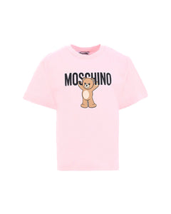 T-shirt panna Moschino Kids in cotone con stampa orsetto Teddy e logo. Comfort e stile per un look casual e riconoscibile ogni giorno.