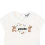 Moschino Kids Pagliaccetto Panna con Stampa e Chiusura con Bottoni sul Retro per Neonati