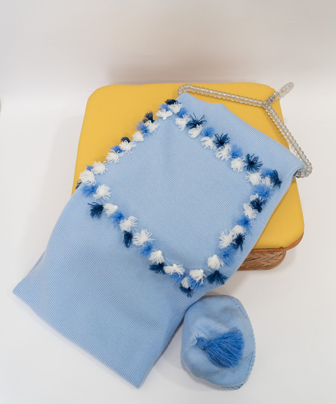 Le Coconnè Coperta Celeste con Pon Pon per Neonati