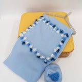 Le Coconnè Coperta Celeste con Pon Pon per Neonati