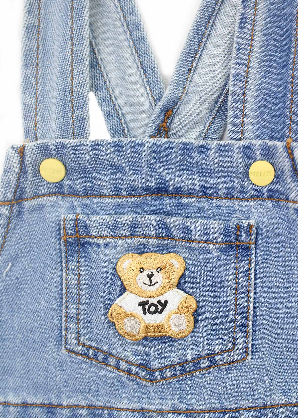 Moschino Kids Salopette in Denim con Teddy per Neonati