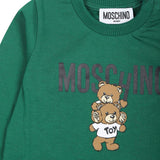 Moschino Kids Blusa Verde con Stampa Logo Teddy Bear per Neonati (dettaglio)