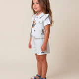 Moschino Kids Smanicato in Denim Bianco a Strisce con Teddy Bear per Neonate