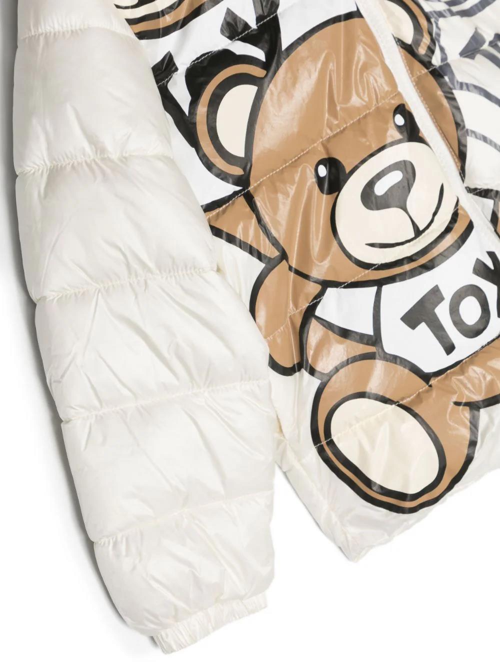 Piumino Teddy Bear Moschino Kids Bianco: Stile e Comfort per Affrontare l'Inverno con Eleganza