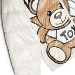 Piumino Teddy Bear Moschino Kids Bianco: Stile e Comfort per Affrontare l'Inverno con Eleganza