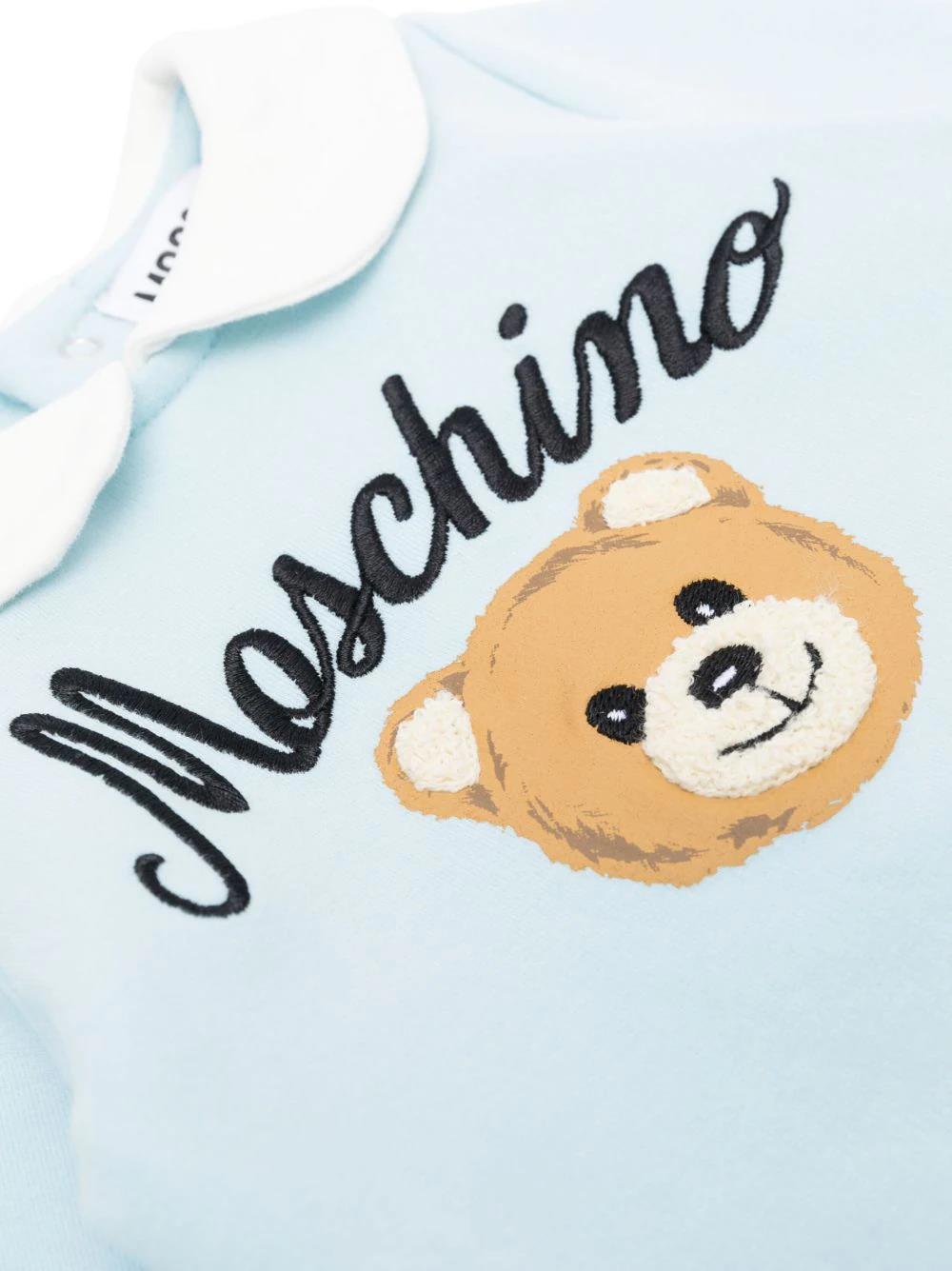 Tutina Celeste con Teddy Bear: Eleganza e Dolcezza per i Bambini di Moschino Kids