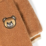 Tutina Moschino Kids Color Caramello con Cappuccio Teddy: Comfort e Stile per il Tuo Bambino